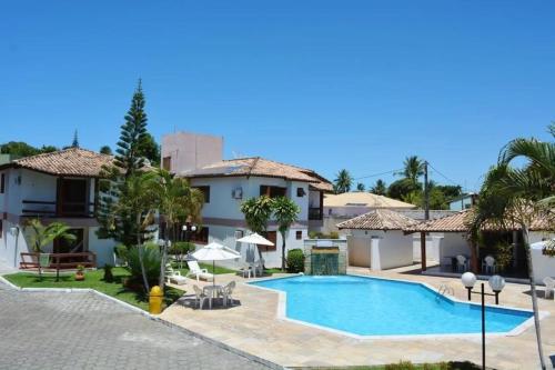Villa con piscina y casa en Apartamento Aldeia da Praia, en Porto Seguro