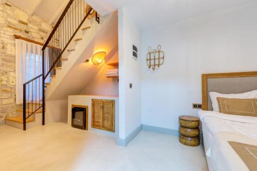 Ένα ή περισσότερα κρεβάτια σε δωμάτιο στο Navalia Hotel