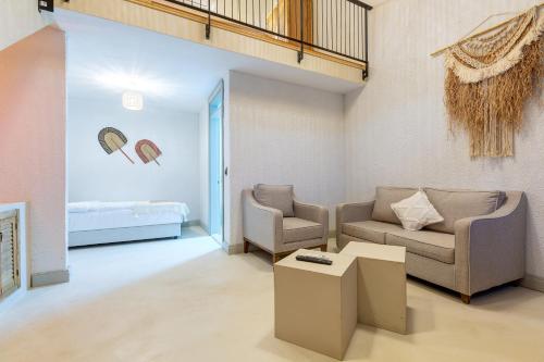 Χώρος καθιστικού στο Navalia Hotel