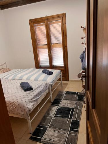 Een bed of bedden in een kamer bij Villa Louv