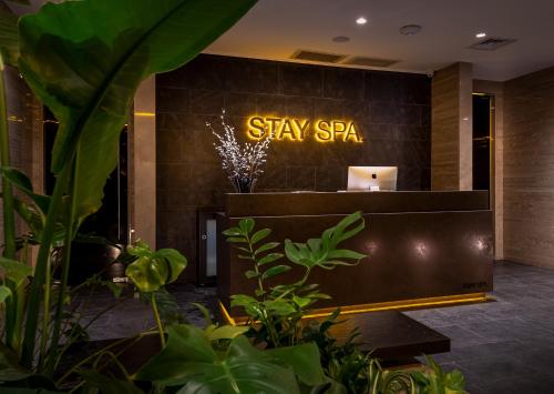 a lobby with a sign that says stay spa at The Stay Boulevard Nisantasi in Istanbul