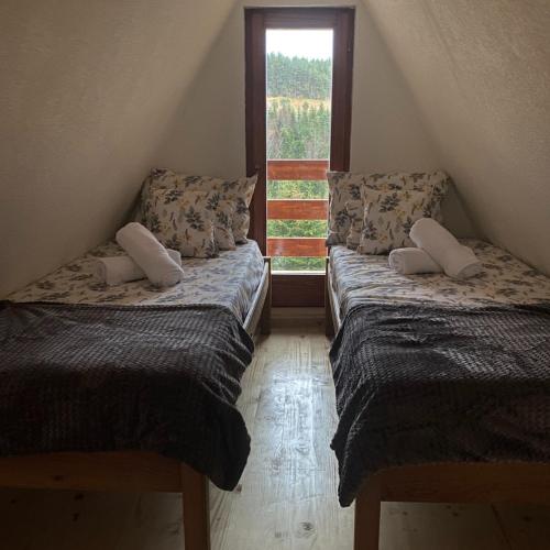 Postel nebo postele na pokoji v ubytování The Tara Concept