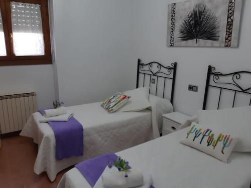 Giường trong phòng chung tại Casa Rural-Casa Murgui
