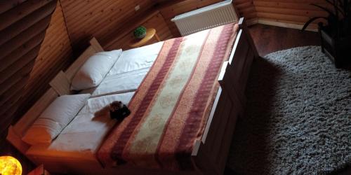 Postel nebo postele na pokoji v ubytování Садиба "Градний Узвіз"