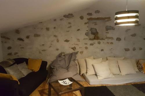 Posezení v ubytování Gîte Les Voûtes du Chambon