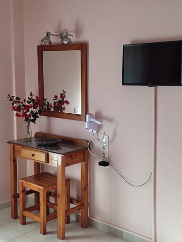 Телевизор и/или развлекательный центр в Su Casa Apartments