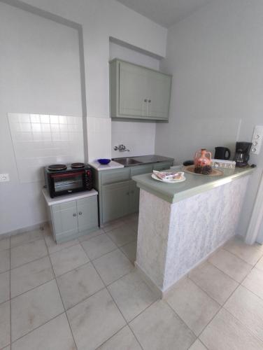 Кухня или мини-кухня в Su Casa Apartments
