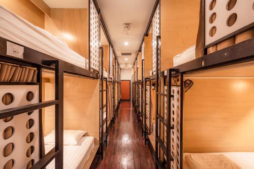 Ένα ή περισσότερα κρεβάτια σε δωμάτιο στο The Dorm Hostel
