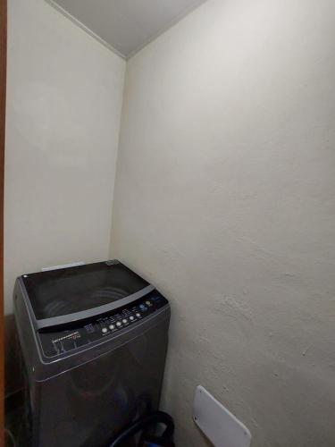 a corner of a room with a trash can at Residence Vibe Dominicus 308 in Bayahibe