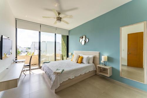 Postel nebo postele na pokoji v ubytování The City Playa