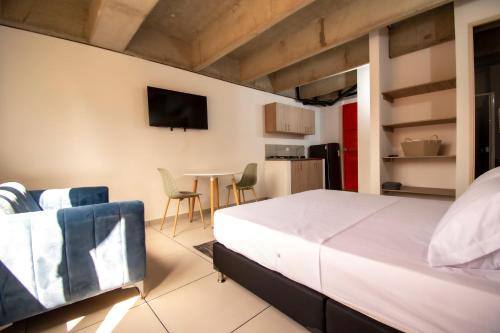 Katil atau katil-katil dalam bilik di Mangata Living by Bernalo Hotels