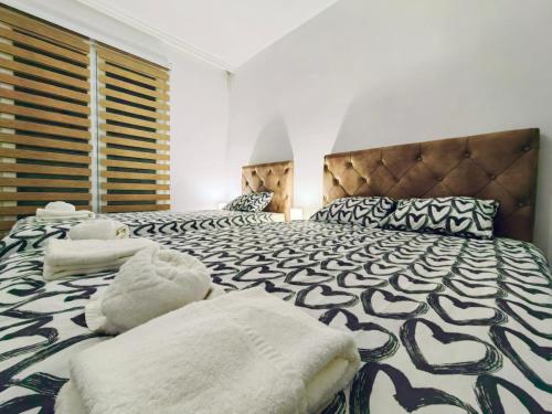 Mialex apartmentsにあるベッド