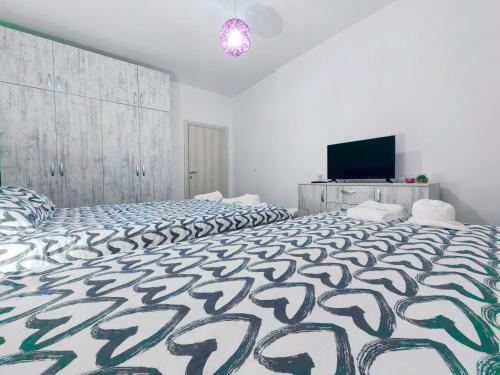 Mialex apartmentsにあるベッド