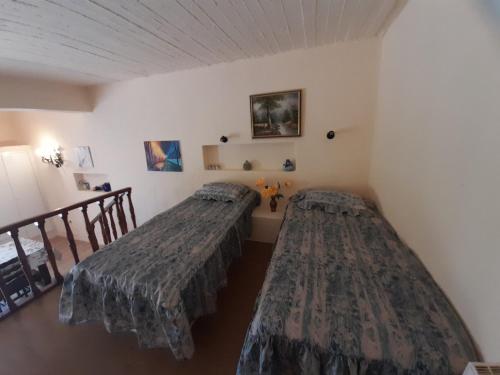 Postel nebo postele na pokoji v ubytování NAVA villa