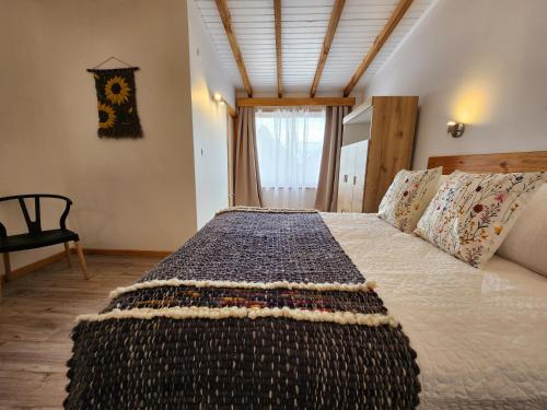 Apart Hotel MiCasaにあるベッド