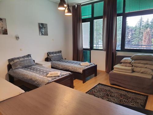 Llit o llits en una habitació de Felix Apartment