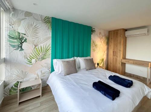 Cama o camas de una habitación en Apartamento Punta Hansa Norte