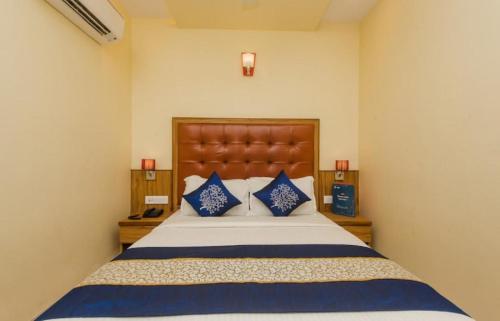 Postel nebo postele na pokoji v ubytování Aster Hotel Near Mumbai Airport