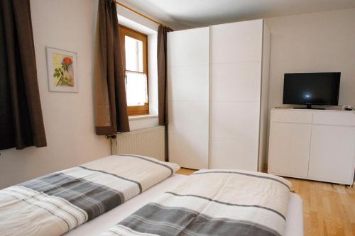 Una cama o camas en una habitación de Appartements DIANA