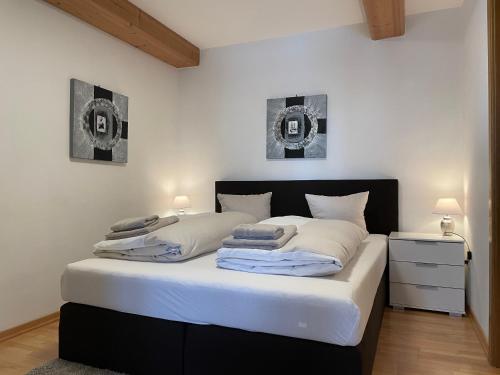 Una cama o camas en una habitación de Appartements DIANA