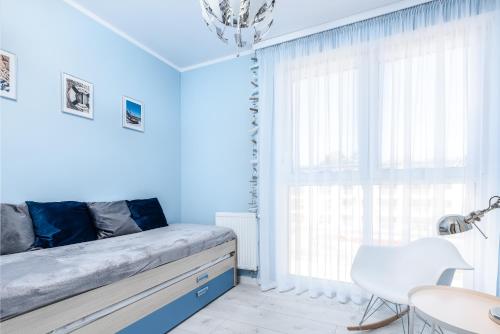 Ένα ή περισσότερα κρεβάτια σε δωμάτιο στο Grape Home