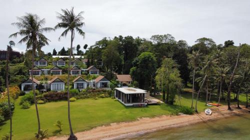 an aerial view of a house with a yard at Little Moon Villa in Ko Mak