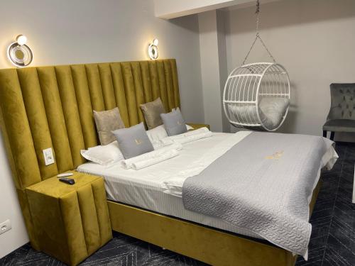Ένα ή περισσότερα κρεβάτια σε δωμάτιο στο Chalet jolie Luxury Vila Sinaia