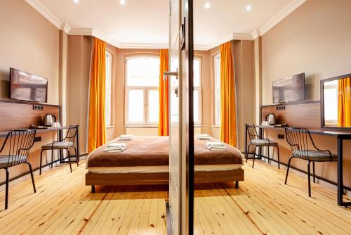 Ένα ή περισσότερα κρεβάτια σε δωμάτιο στο Aram Kerasi Rooms