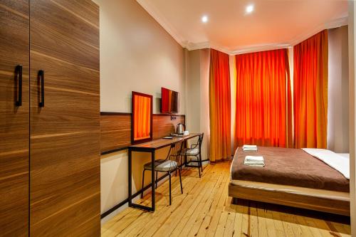 Ένα ή περισσότερα κρεβάτια σε δωμάτιο στο Aram Kerasi Rooms