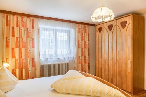 Postel nebo postele na pokoji v ubytování Gästehaus Gisela 2