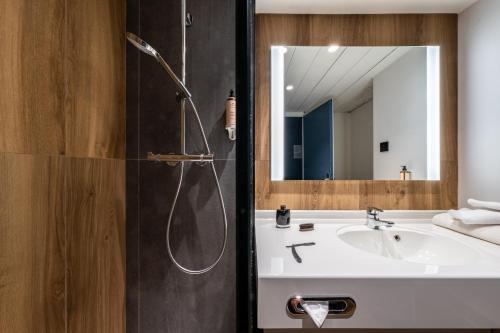 Ванная комната в Mercure Grenoble Centre Alpotel