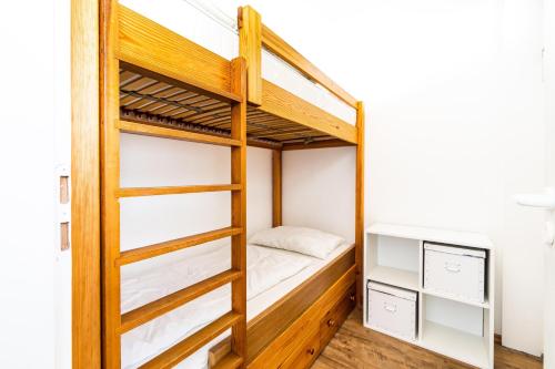 Katil dua tingkat atau katil-katil dua tingkat dalam bilik di Ferienpark Sierksdorf App 108 - Strandlage
