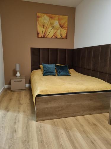 Posteľ alebo postele v izbe v ubytovaní Apartament Słoneczny -Ściegiennego (garaż, centrum)
