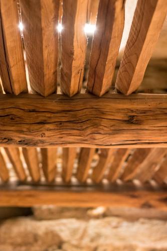 a close up of a wooden shelf in a room at La Mason dla Grà in Frassinetto