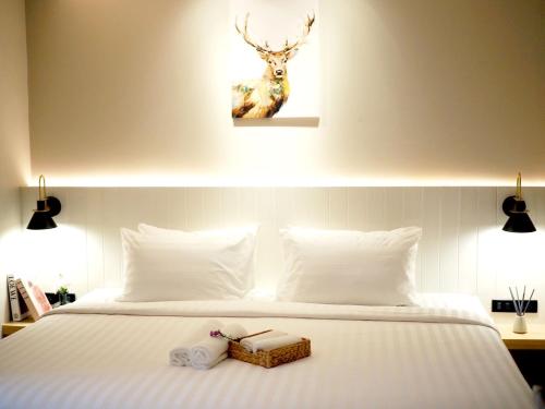 Ascella Bangkok Hotelにあるベッド