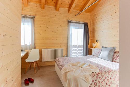 Postel nebo postele na pokoji v ubytování Baita sulle piste in Valmalenco