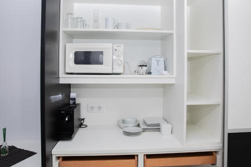 Una cocina o cocineta en Vladys Vienna Apartments