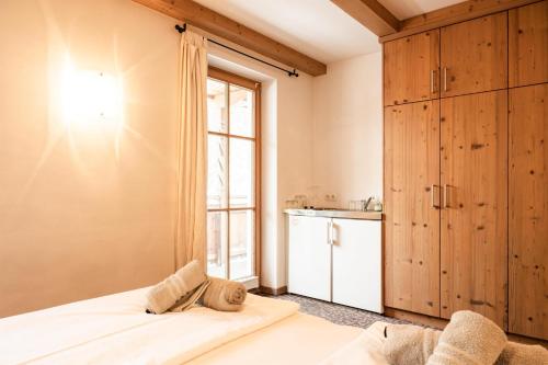 Een bed of bedden in een kamer bij Apartment Neuhäusl