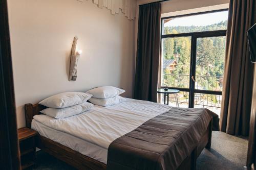 Osonnya Karpaty RESORT MEDICAL & SPAにあるベッド