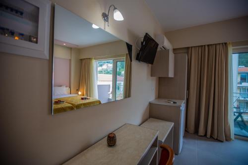 TV a/nebo společenská místnost v ubytování goldenbeach