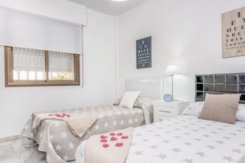 A bed or beds in a room at CT 192 - Mar & Golf - Riviera del Sol
