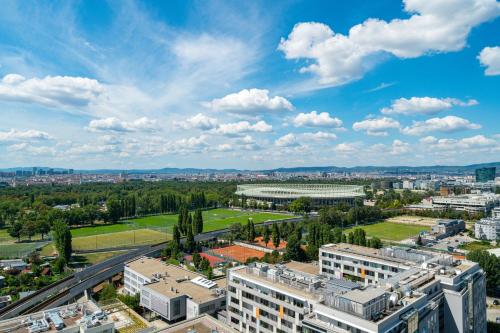 an aerial view of a city with buildings at Vienna Residence, Marina Tower - Danube in Vienna