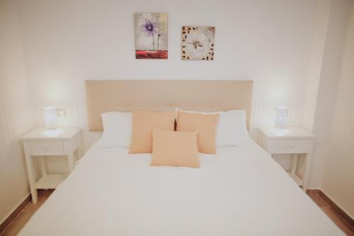 Posteľ alebo postele v izbe v ubytovaní Bonito apartamento con piscina.