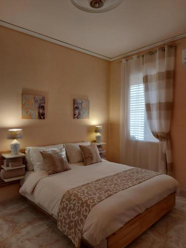 Postel nebo postele na pokoji v ubytování Casa Janette