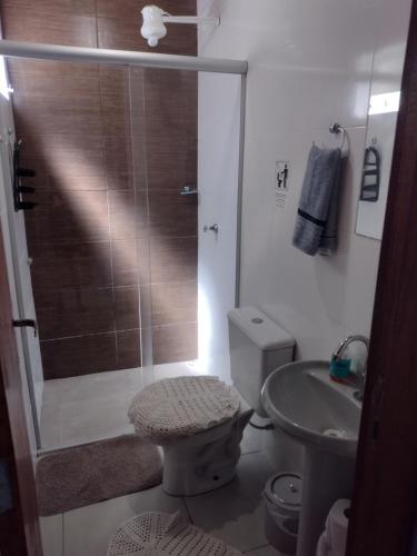 Et badeværelse på Quintal Residencial