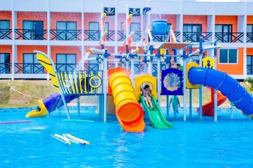 a water park with a bunch of water slides at El Aram Imirá Beach Resort in Natal