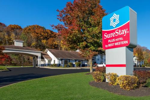 a sign in front of a nursing home at SureStay Plus Hotel by Best Western Highland Poughkeepsie in Highland