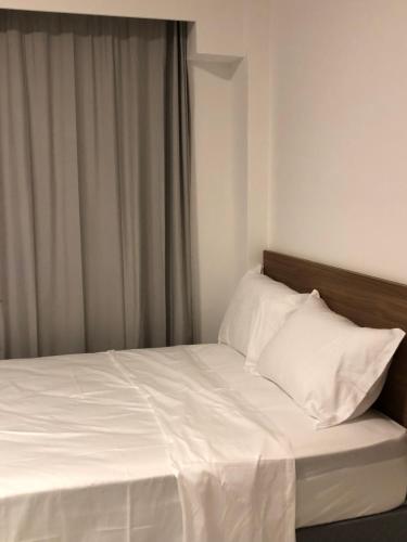 Katil atau katil-katil dalam bilik di Mana Beach Experience Muro Alto B 207