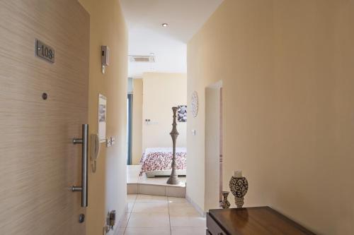 a hallway of a house with a couch in the background at Pallini Court in Protaras