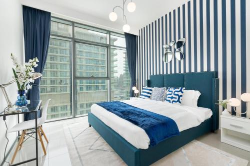 Postel nebo postele na pokoji v ubytování Ultimate Stay / Beachfront / Private Beach / Ain Dubai View / 4 People